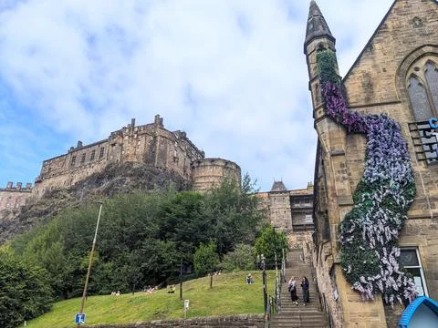 Low angle view of iconic Edinburgh Castle from Grannys Green Steps with Gothic Stock Photos