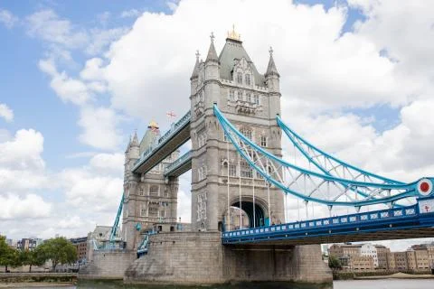 Low Angle View of the Iconic Tower Bridge Under a Cloudy Blue Sky Stock Photos