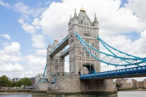 Low Angle View of the Iconic Tower Bridge Under a Cloudy Blue Sky Stock Photos