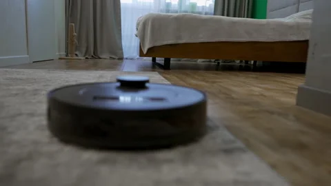 Low angle view if a modern round vacuum cleaner Stock-Footage 171919017