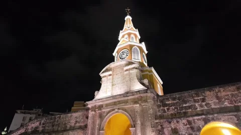 Low Angle View of Illuminated Clock Tower and City Wall at Night in Cartagena Stock Footage 340283156