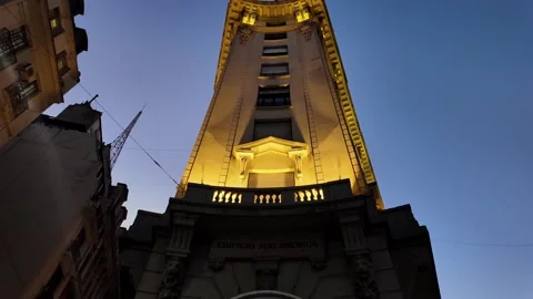 Low angle view of illuminated Edificio Sud America at dusk, Buenos Aires Stock Footage 346548052