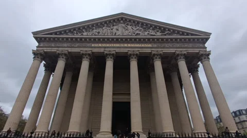 Low-angle view of the impressive facade of The Madeleine Church in Paris, France 스톡 동영상 342167810