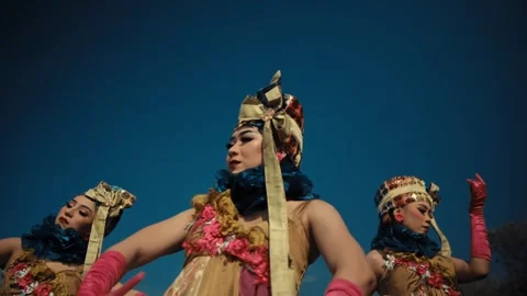 Low Angle View of Indonesian Dancers Performing with Hands Stock Footage 268978435