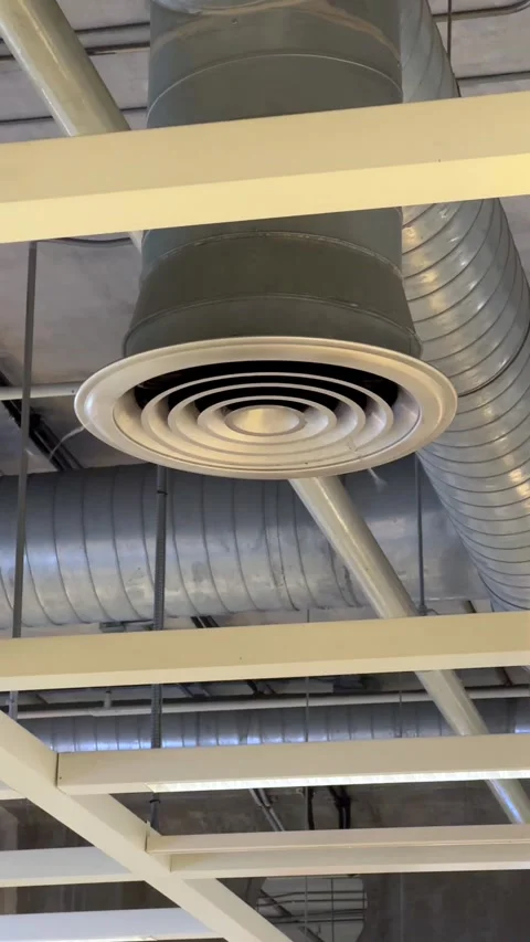 Low Angle View of Industrial Ceiling with Circular HVAC Vent and Exposed Me.. Stock Footage 331873546