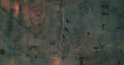 Low angle view inside warehouse. Rows of metallic frameworks. Stock Footage 135130804