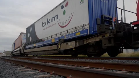 Low Angle View of Intermodal Trailer Wagons on Railway Tracks Stock Footage 337982323