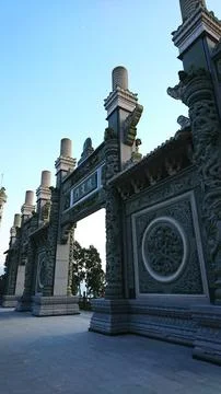 Low angle view of the intricate stone paifang of Wenwu Temple in Taichung under Stock Photos