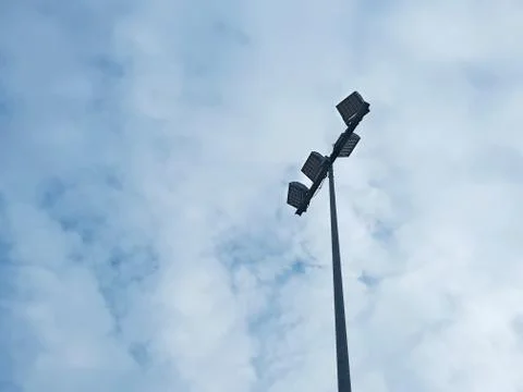 Low Angle View of Lamp Post Against Cloudy Sky Stock Photos