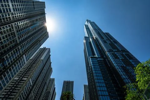 Low Angle View of Landmark 81 Skyscraper with Sun Flare in Saigon Stock Photos
