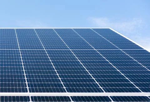 Low angle view of large blue solar panel with selective focus Stock Photos