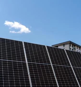 Low angle view of large industrial solar panel Stock Photos