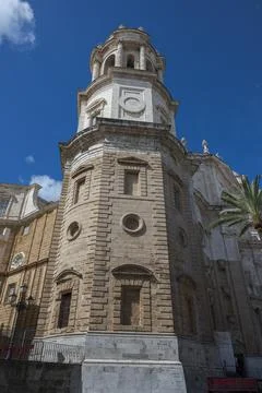 Low-angle view of the Levante Tower (Clock Tower) of Cdiz Cathedral Stock Photos
