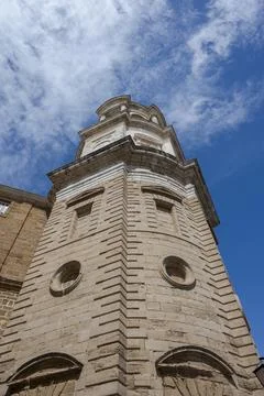 Low-angle view of the Levante Tower (Clock Tower) of Cadiz Cathedral Stock Photos