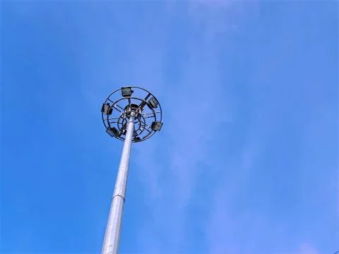 Low Angle View of Lighting Tower Against Blue Sky Stock Photos