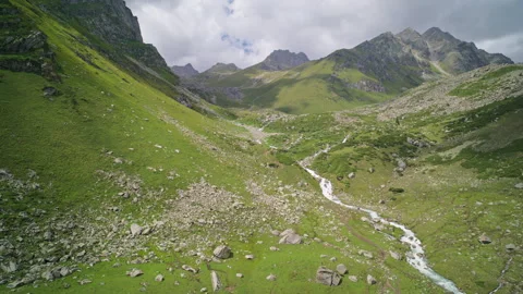 Low-Angle View Looking Up at Mengkete Valley in Xinjiang Stock Footage 346114050