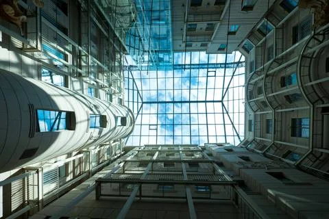 Low Angle View Looking Up at Modern Glass Atrium Skylight Roof Inside Archi.. 写真素材