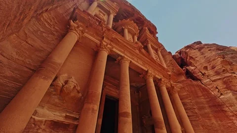 Low Angle View Looking Up at the Towering Al Khazneh Treasury Facade Stock Footage 340177332