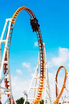 Low angle view of looped roller coaster at Coney Island amusement park, New Stock Photos