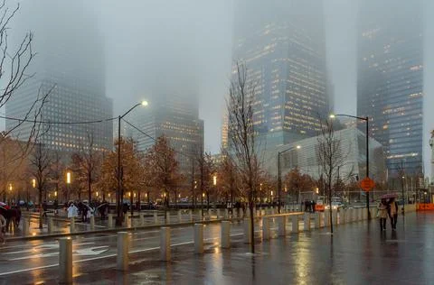 Low Angle View of Lower Manhattan Skyscrapers on a Foggy Night in New York Stock Photos