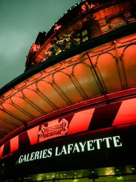 Low angle view of the luxury red illuminated facade of the Galeries 写真素材