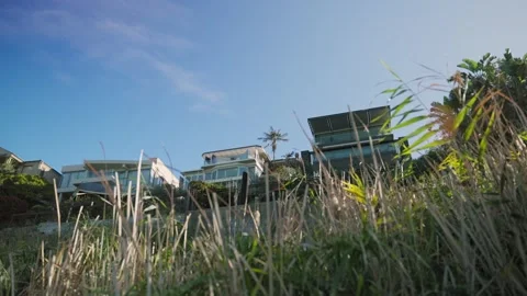 Low angle view on luxury residential houses overlooking the ocean in Sydney Stock Footage 288316121