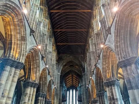 Low angle view of the magnificent Gothic nave and timber roof ceiling of Glasgow Stock Photos