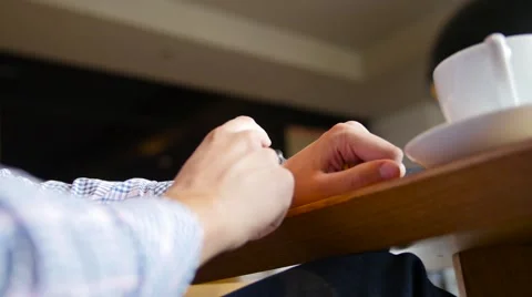 Low angle view of male hands tapping on the touch screen of a smartwatch Stock Footage 64093647