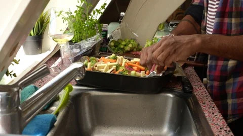 Low angle view man making healthy vegan meal- 25 sec Stock Footage 128015274
