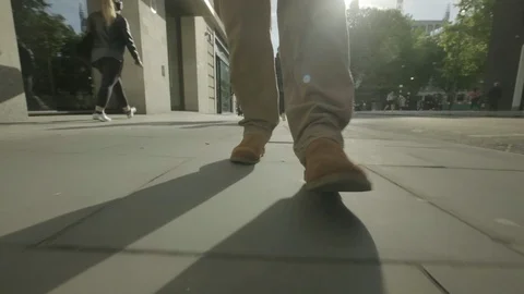 Low angle view of a man walking Video stock 108345807