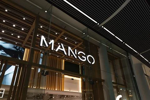 Low Angle View of Mango Clothing Shop Entrance Logo. London, UK, 10 February Stock Photos