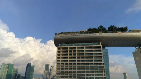 Low Angle view of Marina Bay Sands Hotel Singapore with blue sky Stock Footage 121384999