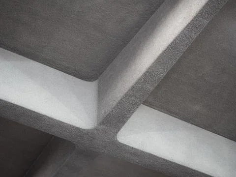 Low angle view of massive concrete crossbeam in form of cross on ceiling indoors Foto stock