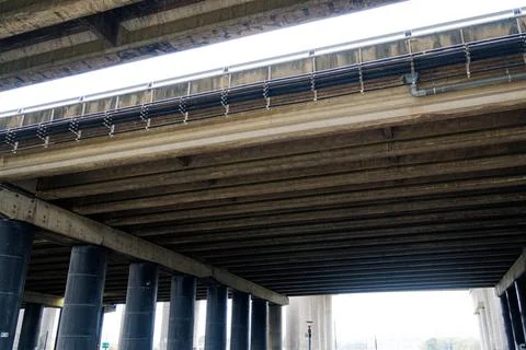 Low Angle View of Massive Concrete Pillars Supporting Elevated Highway Overpa 스톡 사진