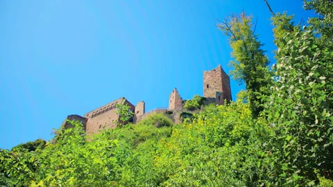 Low angle view of medieval castle ruins emphasizing height stone textures Stock Footage 327568937