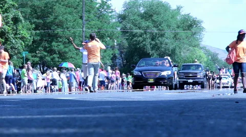 Low angle view-Mia Love, candidate for congress in Utah, in small town parade Video stock 40804934
