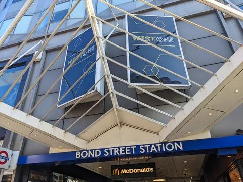 Low angle view of the modern architectural entrance to Bond Street Station on a Stock Photos