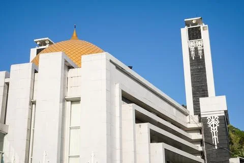 Low-angle view of the modern brutalist architecture of At-Taqwa Kupa Mosque.. Stock Photos