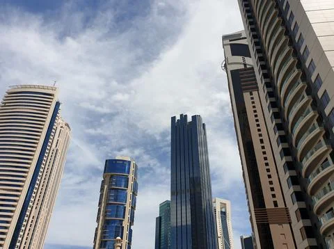 Low angle view of modern glass skyscrapers and corporate office towers Foto stock