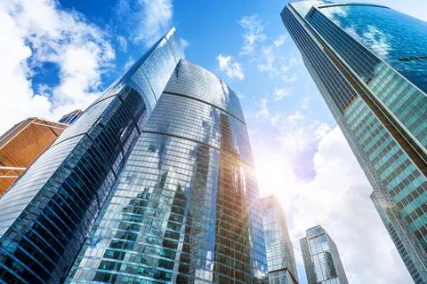 Low angle view of modern glass skyscrapers in Moscow City business district.. Stock Photos