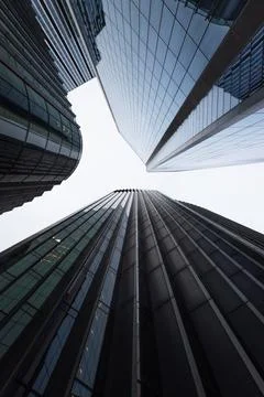 Low angle view of modern glass skyscrapers reaching into the sky 库存照片
