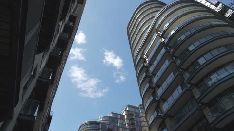 A low angle view of modern high raise residential buildings. Stock Footage 153314753