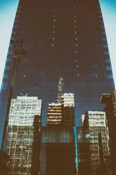 Low angle view of a modern office building facade Stock Photos