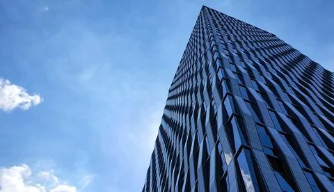 Low angle view of modern office building Stock Photos