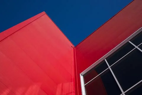 Low Angle View Of  Modern Office Building with Red Facade Stock Photos