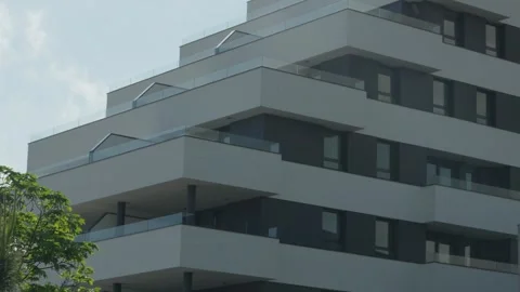 Low Angle View of Modern Residential Tower with Stepped Balconies in Gijon Видео 334832290