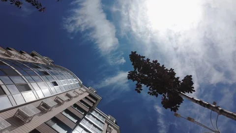 Low angle view of a modern residential building facade on a clear sunny day. Video stock 336948831