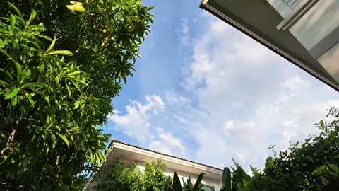 Low Angle View of Modern Residential Architecture under Sky Clouds Timelapse Stock Footage 337111747