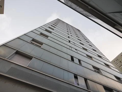 Low angle view of a modern skyscraper in europe. Stock Photos