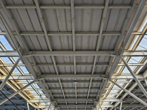 Low angle view of a modern steel framework roof structure. Stock Photos